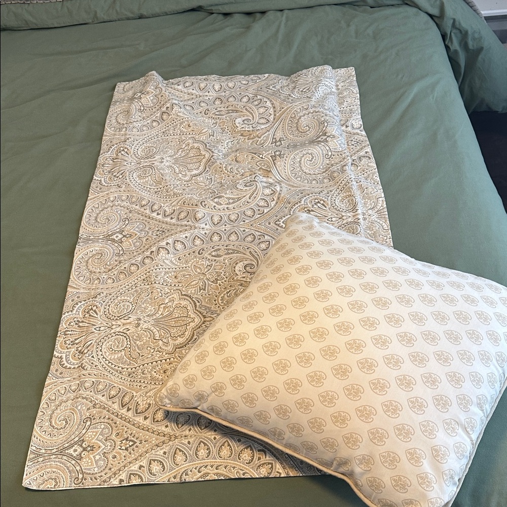 Two King Size Pillow Cases and One Throw Pillow